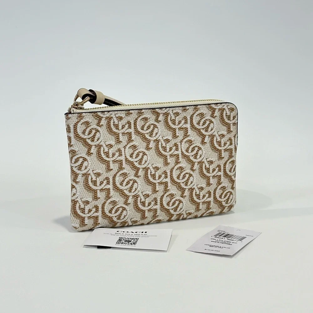 COACH CORNER ZIP WRISTLET WALLET WITH SIGNATURE MONOGRAM PRINT IN CHALK